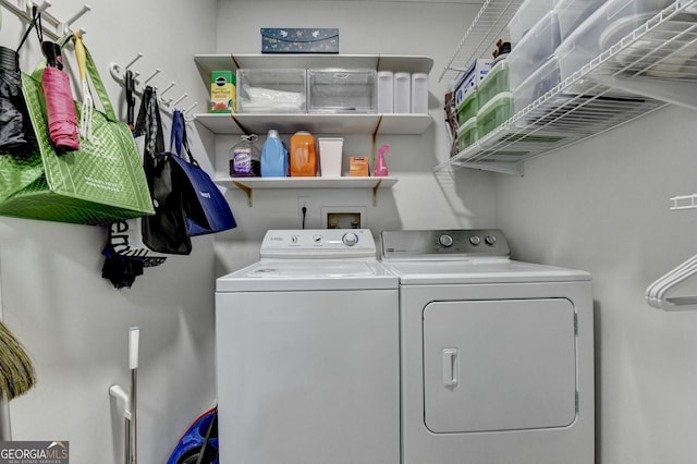 laundry area with separate washer and dryer