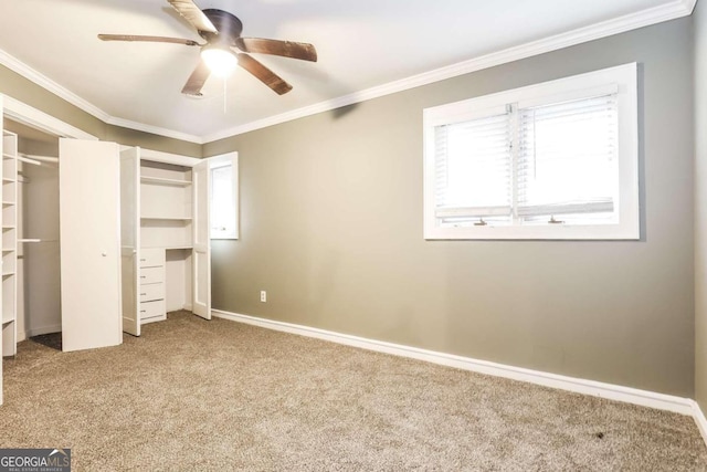 unfurnished bedroom featuring carpet, ceiling fan, and ornamental molding