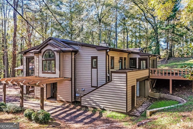 view of front of home with a deck