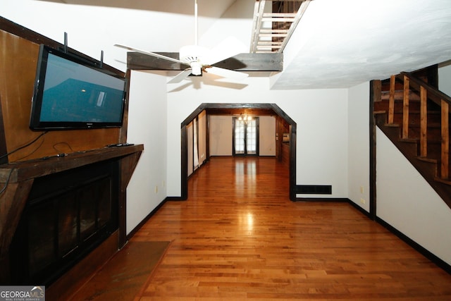 bonus room featuring ceiling fan and wood-type flooring