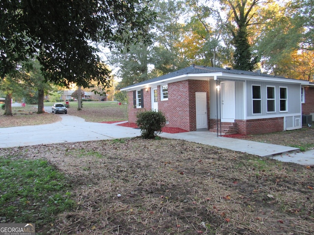 view of front of house with cooling unit