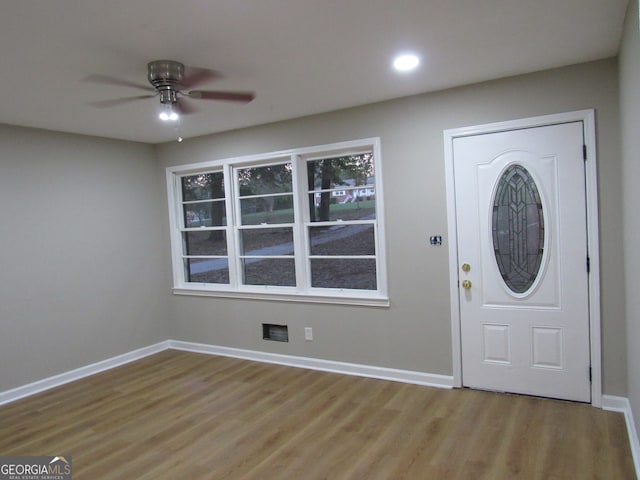 entryway with hardwood / wood-style flooring and ceiling fan