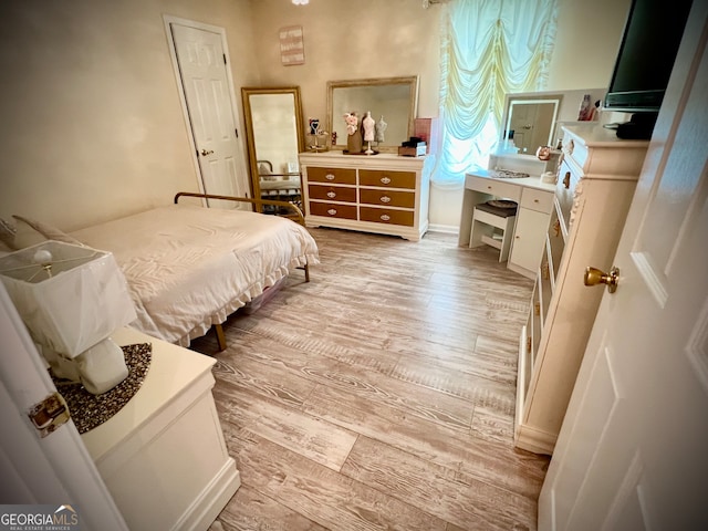 bedroom featuring light hardwood / wood-style flooring