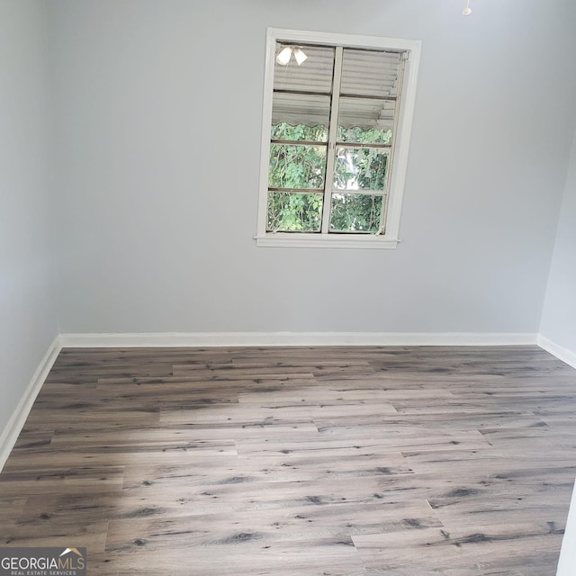 unfurnished room featuring light hardwood / wood-style floors