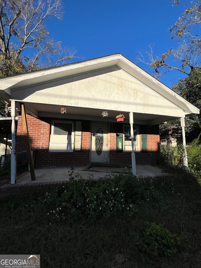 exterior space featuring covered porch