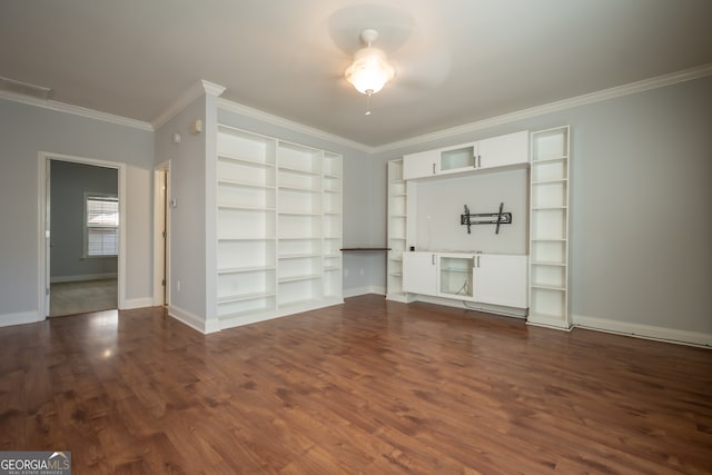 unfurnished living room featuring dark hardwood / wood-style floors, built in features, ceiling fan, and ornamental molding