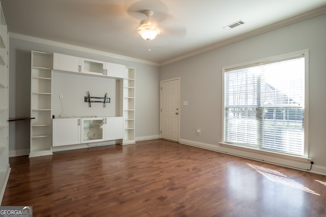 unfurnished living room featuring crown molding, ceiling fan, and dark hardwood / wood-style floors