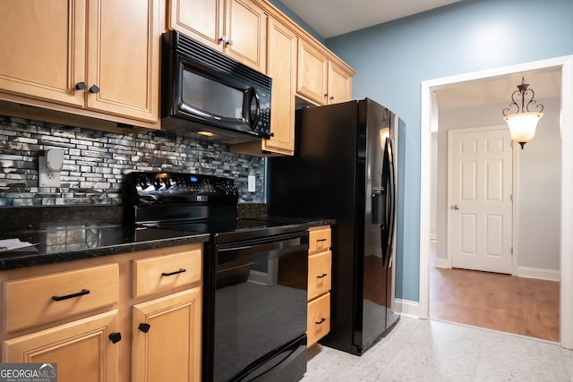 kitchen with light wood-type flooring, tasteful backsplash, black appliances, decorative light fixtures, and dark stone countertops