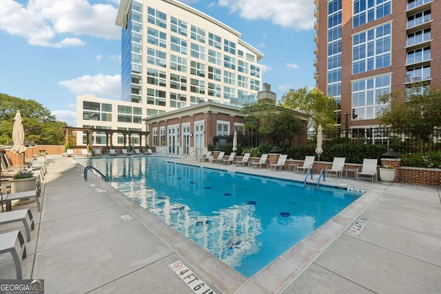 view of pool featuring a patio area