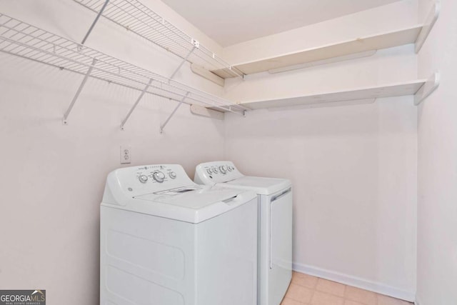 laundry room with washer and dryer