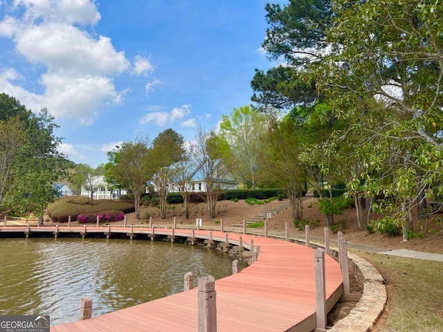 dock area featuring a water view