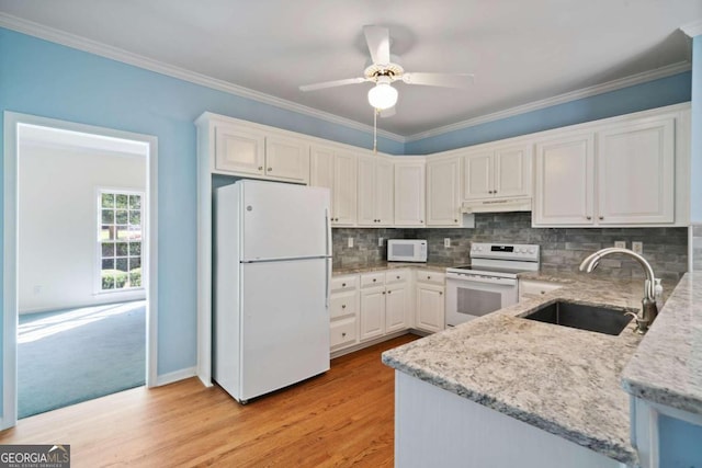 kitchen featuring ceiling fan, sink, light stone countertops, white appliances, and white cabinets