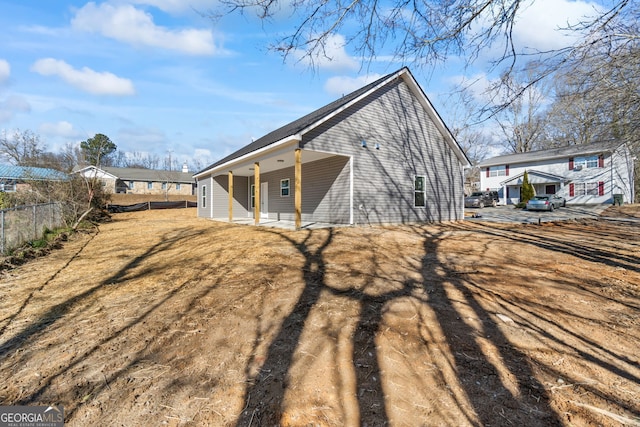 rear view of house with a patio