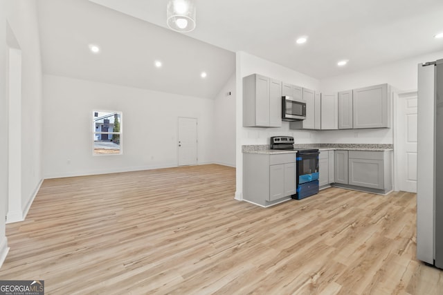 kitchen featuring black / electric stove, gray cabinets, and light hardwood / wood-style flooring