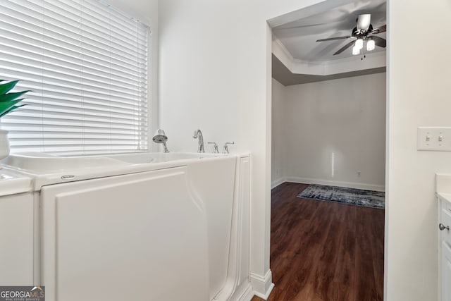 laundry room with ceiling fan, washer / dryer, wood-type flooring, and a wealth of natural light