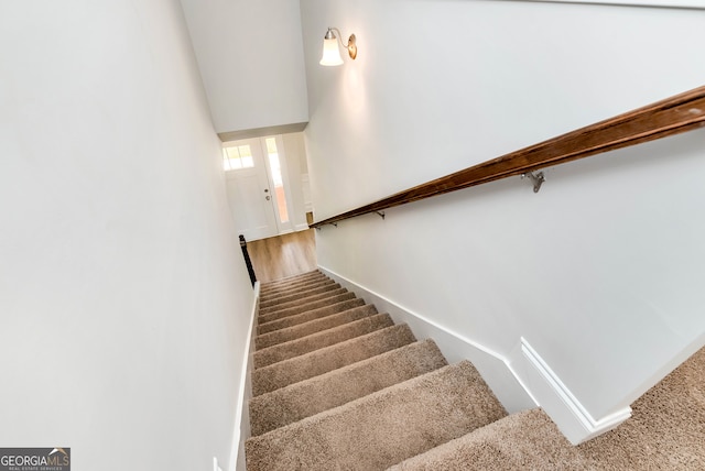 stairway with carpet flooring