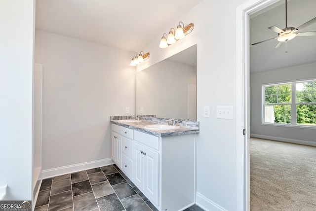 bathroom featuring vanity and ceiling fan