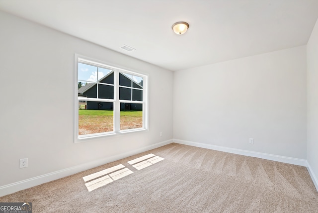 empty room featuring carpet