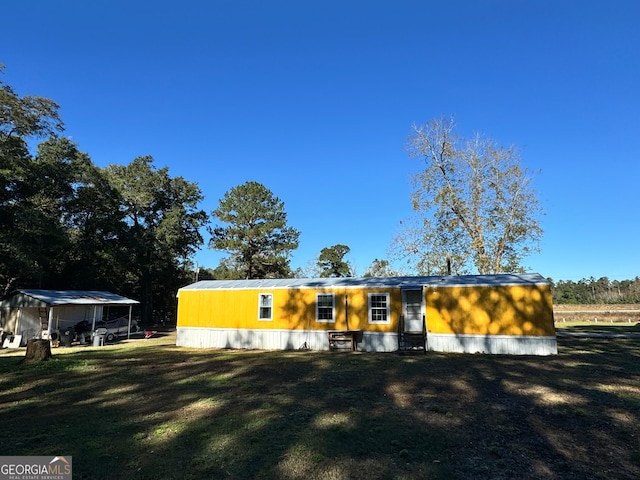 exterior space with a yard