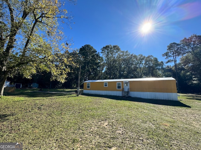 view of front of house with a front lawn