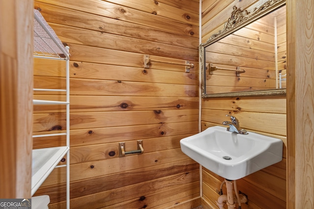 bathroom with wooden walls