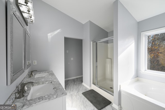 bathroom with plus walk in shower, vanity, and vaulted ceiling