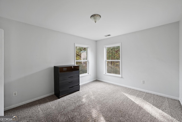 unfurnished bedroom featuring carpet floors