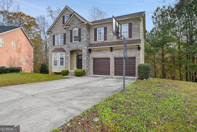 view of front facade featuring a front lawn and a garage