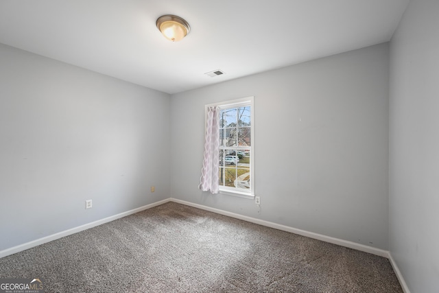 unfurnished room with carpet