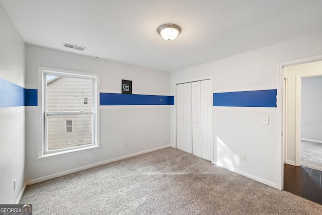 view of carpeted spare room