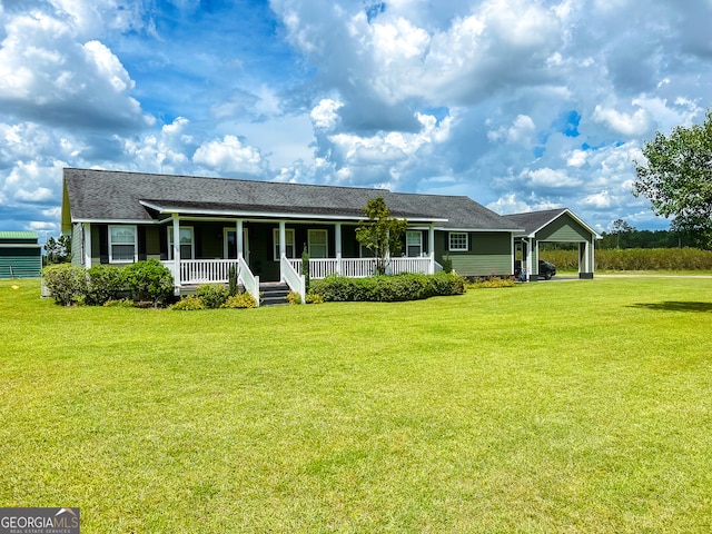 ranch-style house featuring a porch and a front lawn