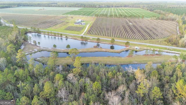 aerial view featuring a water view and a rural view