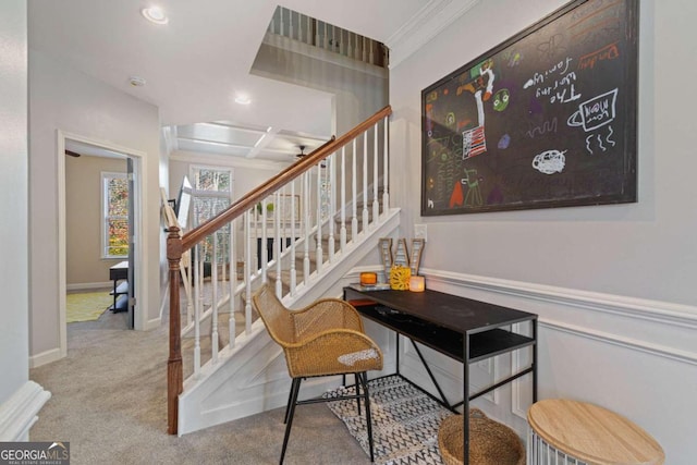 stairs featuring carpet flooring, beam ceiling, crown molding, and coffered ceiling