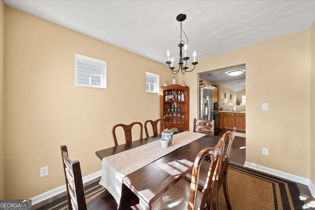 dining room with an inviting chandelier