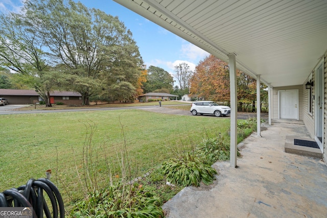 view of yard featuring a porch