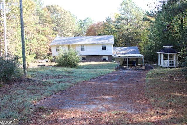 exterior space featuring a carport