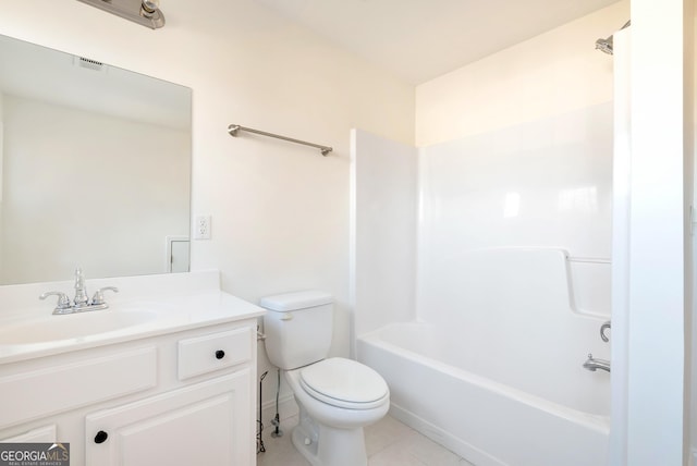 full bathroom with tile patterned floors, vanity, shower / bath combination, and toilet