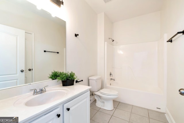 full bathroom with tile patterned flooring, vanity, toilet, and shower / washtub combination