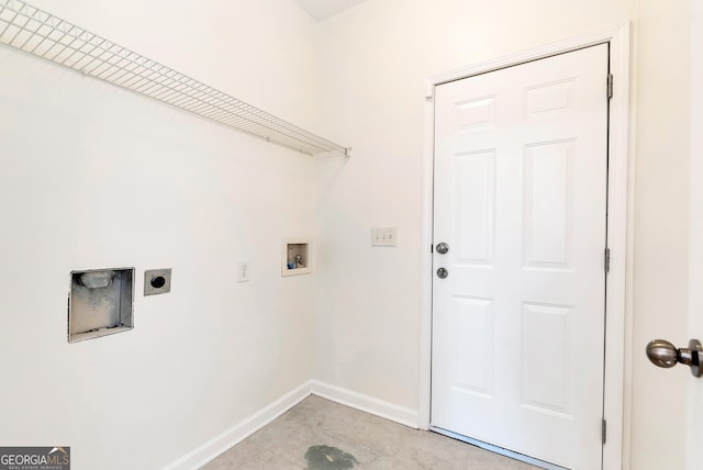 laundry room with washer hookup, electric dryer hookup, and light tile patterned floors