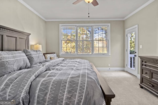 carpeted bedroom featuring ceiling fan, access to exterior, and crown molding