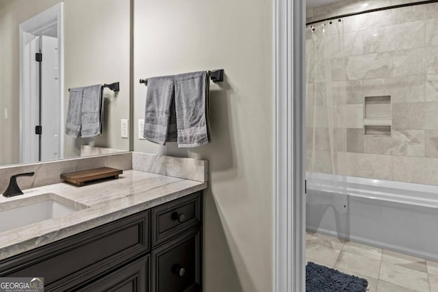 bathroom with tile patterned floors, vanity, and an enclosed shower