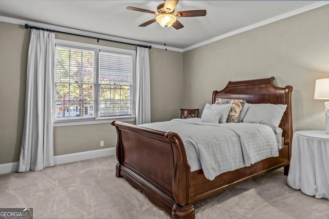 bedroom featuring light carpet, ceiling fan, and crown molding