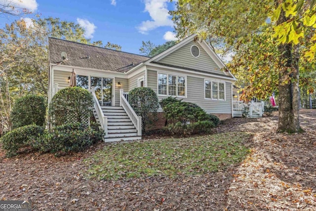 view of front of home with a deck