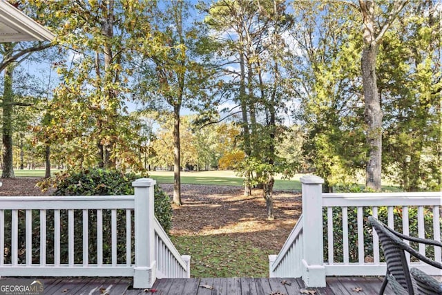 view of yard with a wooden deck