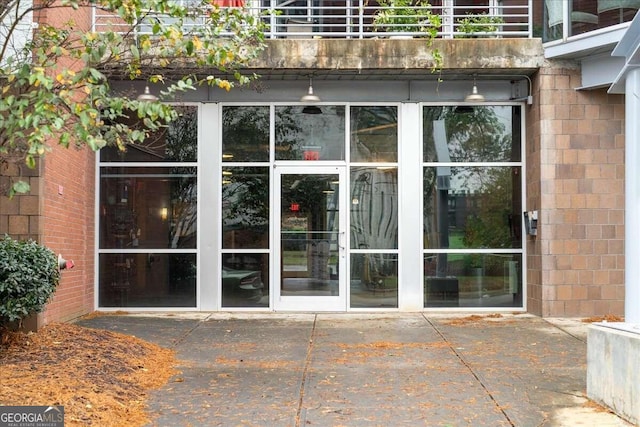 doorway to property with a patio