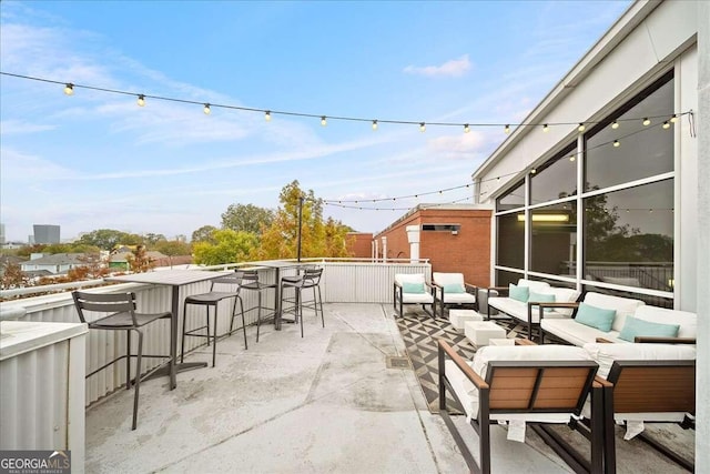 view of patio featuring outdoor lounge area and an outdoor bar