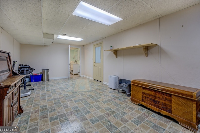 basement with a drop ceiling