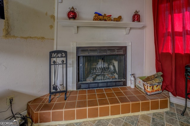 room details with a tile fireplace