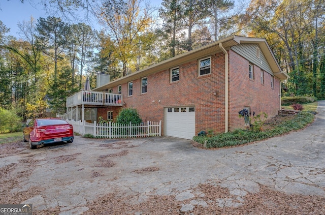 exterior space with a garage