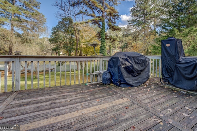 wooden deck with area for grilling